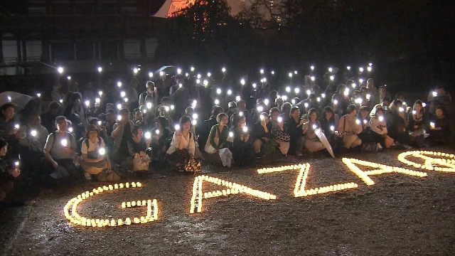 Japanische NGOs zünden Kerzen an, um einen Waffenstillstand in Gaza zu erreichen